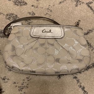 White coach wristlet in good condition